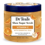 Dr Teal's Gommage Corps au Sucre de Karité Agrumes Huiles Essentielles et Vitamine C 539g, avec des images de tranches d'orange. L'étiquette met en avant le beurre de karité, l'huile d'orange, l'huile d'avocat, et indique qu'il ne contient ni parabène ni phtalate. Dakar