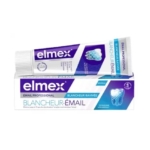 Une boîte et un tube de dentifrice Elmex Professional Blancheur-Émail présentant un motif bleu et blanc, une illustration de dent et un texte français promouvant le blanchiment de l'émail. Dakar