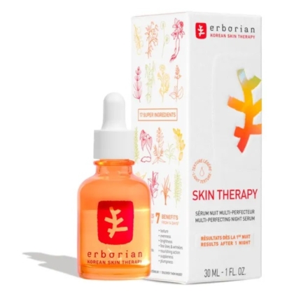 Un flacon en verre orange avec un bouchon compte-gouttes blanc étiqueté "erborian Korean Skin Therapy" se trouve à côté de sa boîte blanche, qui présente des illustrations botaniques et les détails du produit pour un sérum de nuit. Dakar