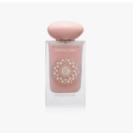 Le Gulf Orchid Musk Collection Cotton Candy Eau de Parfum mixte 60ml se présente sous la forme d'un flacon rose avec un bouchon rose arrondi et un motif circulaire décoratif sur le devant. Dakar