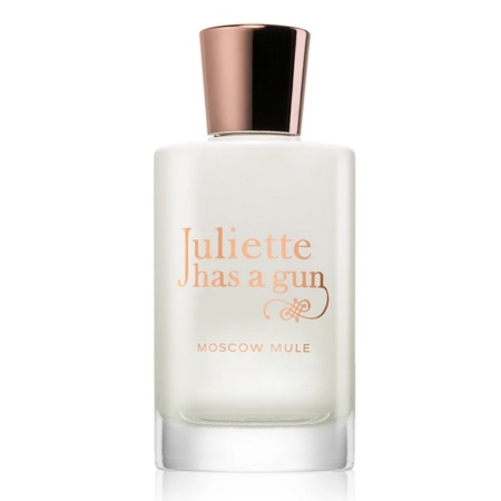 Un flacon de parfum en verre givré avec un bouchon en or rose, étiqueté "Juliette has a gun" en pêche et "MOSCOW MULE" en dessous en texte plus petit. Dakar
