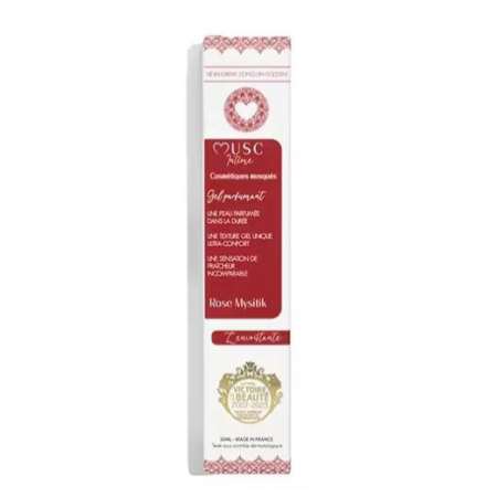 Une boîte rectangulaire blanche et rose de Musc Intime Gel Parfumant Intime Rose Mystik 30ml se tient debout sur un fond blanc, avec des motifs décoratifs et un texte en français sur le devant. Dakar
