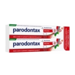 Deux boîtes de dentifrice Parodontax Original avec un emballage rouge, blanc et vert, représentant une fleur de marguerite et une icône de dent. Les boîtes sont étiquetées comme un pack à prix spécial avec deux tubes de 75 ml chacun. Dakar