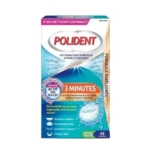 La boîte de Polident Corega 3 Minutes Nettoyant pour Appareils Dentaires 66 Comprimés présente des bulles bleues, une étiquette "3 Minutes", un nettoyage en profondeur et des informations sur la saveur de menthe fraîche. La plupart des textes sont en français. Dakar