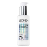 Un flacon blanc de Redken Acidic Bonding Concentrate 24/7 Night & Day Serum avec une pompe argentée, comportant un texte sur le renforcement, l'hydratation et la protection des cheveux exigeants et traités. Format de 100 ml. Dakar
