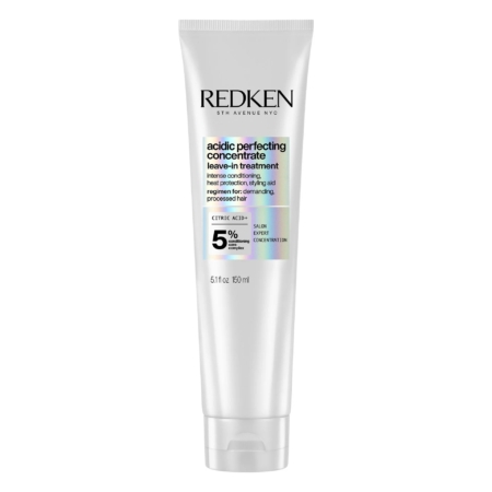 Tube blanc de Redken Acidic Perfecting Concentrate Leave-In Treatment avec de l'acide citrique, concentration de 5%, pour les cheveux traités. Le tube est de 150 ml (5.1 fl oz) et comporte un texte noir et holographique. Dakar