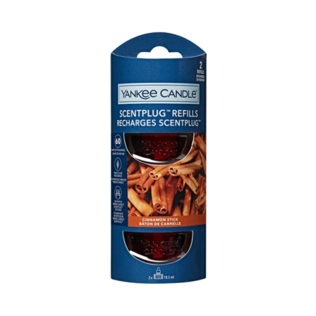 Recharges ScentPlug de Yankee Candle, senteur bâton de cannelle, emballées dans une boîte bleue avec des images de bâtons de cannelle et deux flacons de recharge rouges visibles. L'emballage contient deux recharges et mentionne jusqu'à 60 jours de parfum. Dakar