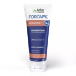 Le tube de 200 ml du shampooing Arko Pharma Forcapil Keratin+, dont l'emballage est bleu, blanc et orange, favorise la force et la réparation grâce à la kératine et affirme que les cheveux sont réparés à 95 % en 3 jours. Le texte est en français et en anglais. Dakar