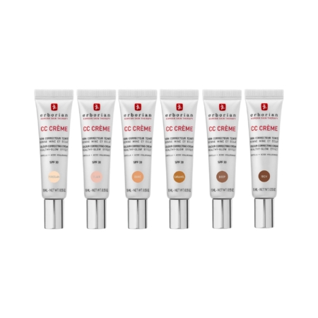 Six tubes de Erborian CC Crème Soin Correcteur Teinté Bonne Mine Et Eclat, tous debout, présentent les teintes Porcelaine, Clair, Doré, Caramel et Riche sur un fond blanc. Dakar