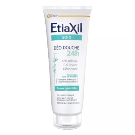 Tube blanc d'Etiaxil Soin Déo-Douche 24h pour peaux sensibles, avec des textes et des graphiques bleus et verts. Le produit est décrit comme un gel anti-odeur, nettoyant et déodorant doux pour les peaux sensibles. Dakar