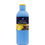 Un flacon en plastique bleu de gel douche Felce Azzurra avec une texture nervurée, comportant une étiquette bleu foncé avec des images de fleurs de vanille et de gousses de vanille, et un texte indiquant que le parfum est Ebène et Vanille. Dakar