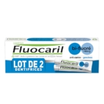 Boîte de dentifrice Fluocaril bi-fluoré avec deux tubes, étiquetés 145mg, anti-caries, et pour les gencives. Le texte en français promeut la prévention des caries et le renforcement de l'émail. Dakar