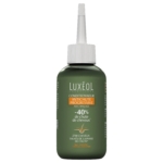 Un flacon vert de l'après-shampoing Luxéol Anti-Chute Progressif avec un bouchon applicateur pointu, étiqueté comme réduisant la chute des cheveux de 40% et sauvant 2700 cheveux, avec un texte en français et des accents dorés sur le devant. Dakar