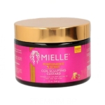 Un pot de 12 oz de Crème Sculptante Mielle Grenade & Miel avec un couvercle doré et une étiquette rose, conçu pour les cheveux épais, bouclés, de type 4 pour définir les boucles avec une hydratation en profondeur. Dakar