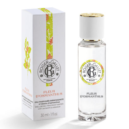Le flacon en verre transparent de Roger et Gallet Fleur D'Osmanthus Eau de Parfum 30 ml se trouve à côté de sa boîte blanche à l'illustration florale et aux accents orangés. Tous deux portent le logo de la marque et le nom du produit. Dakar