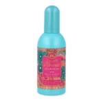 Un flacon turquoise de Tesori d'Oriente Ayurveda Aromatic Perfume avec une étiquette rose et or présentant des motifs floraux et un texte décrivant les ingrédients du produit : huile d'amla et patchouli. Dakar