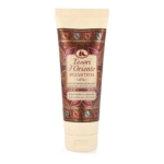 Un tube de crème de douche aromatique Tesori d'Oriente Byzantium à la rose noire et au labdanum, avec une étiquette décorative brune et dorée aux accents de bijou. Dakar