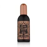 Un flacon noir de 100 ml de Tesori D'Oriente Hammam Eau De Toilette avec un bouchon cuivré et une étiquette ornée de motifs décoratifs or et orange. Dakar