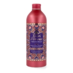 Un flacon rouge de crème de bain aromatique Tesori d'Oriente Persian Dream, décoré de motifs complexes bleus, or et roses, dont l'étiquette mentionne la grenade et le thé rouge. Dakar