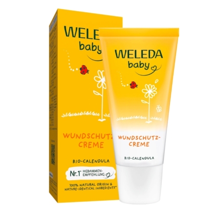 Une boîte jaune et un tube de Weleda Crème pour l'Érythème Fessier au Calendula 30 ml, avec des motifs de fleurs et de coccinelles, avec une étiquette indiquant "Bio-Calendula" et "100% natural origin & nature-identical ingredients" (origine naturelle et ingrédients identiques à ceux de la nature). Dakar