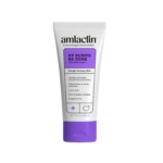 Amlactin Crème Anti Kératose Pilaire à 15 % d'Acide Lactique AHA 85g se présente dans un tube blanc et violet. Elle cible les peaux rugueuses et bosselées et l'étiquette met en avant ses bienfaits exfoliants et hydratants. Dakar