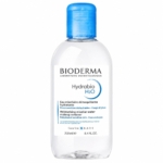 Une bouteille en plastique transparent contenant 250 ml d'eau micellaire démaquillante hydratante Bioderma Hydrabio H2O, dotée d'un bouchon à rabat bleu, conçue pour les peaux déshydratées et sensibles du visage et du contour des yeux. Dakar