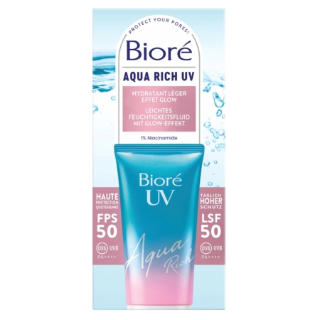 Une boîte de Bioré Fluide Solaire Hydratant SPF 50 Aqua Riche UV Effet Glow de 50 ml se présente sous la forme d'un tube bleu et rose, portant la mention « Hydratant Léger Effet Glow », la mention « haute protection quotidienne » et un fond inspiré de l'eau. Dakar