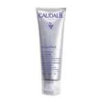 Un tube argenté de Crème Correctrice des Taches Brunes Vinoperfect de Caudalie, 50 ml, orné d'un texte violet et d'illustrations de raisins — idéal à associer au Stick BARIÉDERM CICA d'Uriage pour Fissures et Crevasses du Corps, des Mains et des Pieds, 22 g, pour un soin complet des mains. Dakar