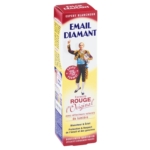 Boîte de dentifrice Email Diamant, représentant un homme en costume historique tenant une dent, avec un texte en français soulignant ses avantages en matière de blanchiment et de protection. L'emballage est principalement blanc, rouge et jaune. Dakar