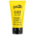 Un tube jaune de 150 ml de gel coiffant « Got2b Glued Spiking Glue » à fixation extra forte, avec un texte en noir, un bouchon noir, une formule résistante à l'eau pour une tenue extrême, et les informations sur le produit en allemand et en français. Dakar