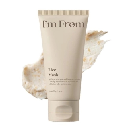 Un tube beige du masque « I’m From Rice Glow Peel Off Masque Peel Off Éclat Instantané » de 70 g est représenté debout, sa texture onctueuse s'étalant derrière lui sur un fond blanc. Dakar