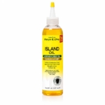 Une bouteille en plastique transparent contenant l'huile « Jamaican Mango & Lime Island Oil », munie d'un bouchon jaune. L'étiquette met en avant l'huile de graines de moringa, le miel de manuka et des bienfaits tels que l'apaisement du cuir chevelu, l'hydratation et l'absence d'accumulation de résidus. Contenance : 237 ml. Dakar