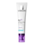 Un tube blanc de La Roche-Posay Mela B3 Soin Yeux Correcteur Intensif Anti-Cernes et Anti-Rides, 15 ml, muni d'un bouchon-pompe violet, conçu pour corriger en profondeur les cernes et illuminer le contour des yeux. Dakar
