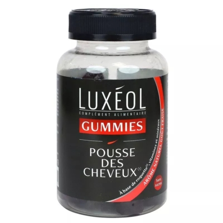 Un flacon transparent de Luxéol Gummies pour la croissance des cheveux avec un couvercle noir. L'étiquette est noire avec un texte blanc et rouge en français, indiquant "Pousse des Cheveux" et soulignant les arômes naturels et sans sucres ajoutés. Dakar