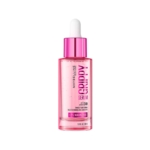 Un flacon rose clair de « Maybelline Grippy Serum », muni d'un bouchon compte-gouttes blanc et d'un col rose métallisé, sur lequel figure une étiquette indiquant une teneur en niacinamide de 2 % et une tenue du maquillage pendant 24 heures. Dakar