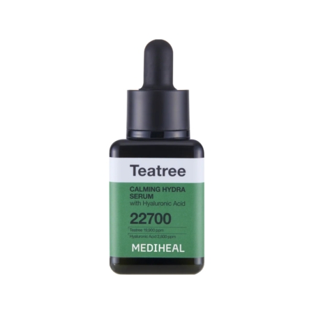 Un flacon de Skin1004 Madagascar Centella Probio Cica Intensive Ampoule Sérum Repulpant et Hydratant 50ml (Copie), avec une étiquette verte et blanche et un bouchon compte-gouttes noir, affiche "22700" et met en évidence les principaux ingrédients hydratants. Dakar
