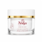 Nirlys Paris Crème de Jour Éclat et Anti Tache 50 ml se présente dans un pot en verre transparent avec un couvercle blanc et or, avec une étiquette au texte rouge, une silhouette de femme minimaliste et une formule à base de curcuma et de carotte. Dakar