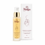 Un flacon et une boîte de 50 ml de Nirlys Paris Sérum Éclat Anti Tache Carotte et Curcuma, dans un emballage blanc et or, avec un dessin de femme minimaliste et des détails sur le produit en français et en anglais. Dakar