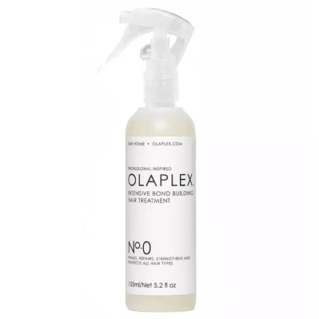 Un flacon pulvérisateur blanc contenant le traitement capillaire Olaplex No. 0 Intensive Bond Building Hair Treatment, 155ml/5.2 fl oz, avec un texte noir et un bouchon transparent, sur un fond blanc uni. Dakar
