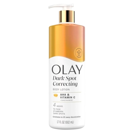 Un flacon de 502 ml de la lotion Olay « Corps Correctrice de Taches Brunes » à base d'AHA, de vitamine C et de niacinamide, au design blanc, avec un bouchon doré dégradé et un distributeur à pompe ; aide à atténuer les taches brunes. Dakar