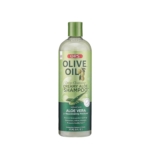 Un flacon de 473 ml de Ors Olive Oil Shampoing Crème Nettoyant Profond A L'Aloe Vera Et à L'Huile D'Olive, avec des images d'olives et d'aloe vera pour souligner ses bienfaits hydratants. Dakar