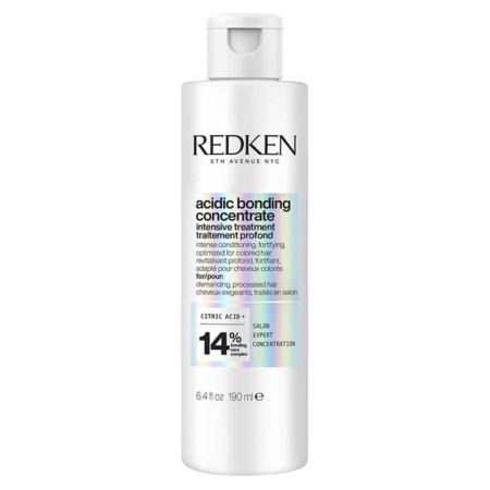 Un flacon blanc de « Redken Acidic Bonding Concentrate Masque Pré-traitement - répare et fortifie » de 190 ml, muni d'un bouchon à rabat et d'une étiquette irisée, contenant un complexe à base d'acide citrique à 14 % pour une réparation et un renforcement intensifs. Dakar
