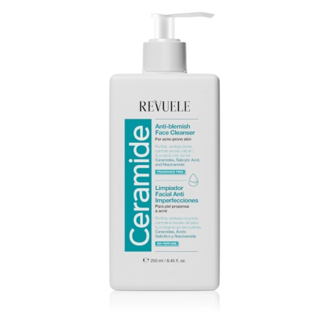 Un flacon pompe blanc contenant le nettoyant visage anti-imperfections Revuele Ceramide, destiné aux peaux à tendance acnéique, d'une contenance de 250 ml. L'étiquette comporte des inscriptions en bleu et turquoise, en anglais et en espagnol, et met en avant des ingrédients tels que l'acide salicylique et la niacinamide. Dakar