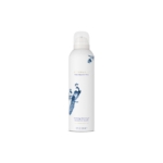 Un flacon blanc de gel douche moussant Rituals avec des illustrations de fleurs et d'oiseaux bleus, avec un bouchon transparent et un design minimaliste. L'étiquette indique "Rituals... Tokyo & Japanese Yuzu. Dakar