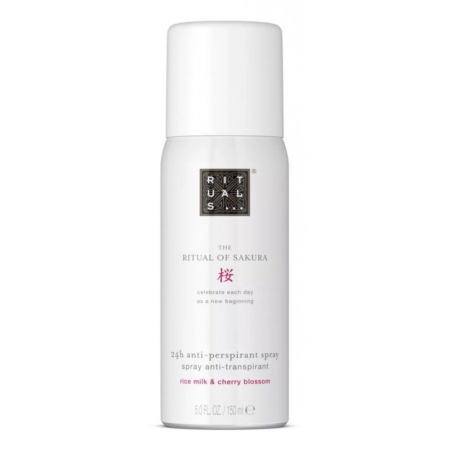 Flacon blanc du spray anti-transpirant 24h "The Ritual of Sakura" de Rituals, à base de lait de riz et de fleurs de cerisier, avec un texte minimaliste et un logo argenté et noir sur le devant. Dakar