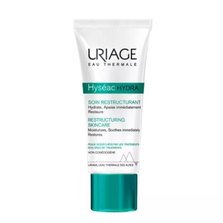 Un tube blanc de 40 ml de « Uriage Hyséac Hydra Soin Hydratant et Restructurant pour les peaux desséchées par les traitements », rehaussé de touches de bleu et de vert, est présenté debout sur un fond blanc ; ce produit est destiné à hydrater et apaiser les peaux sèches. Dakar