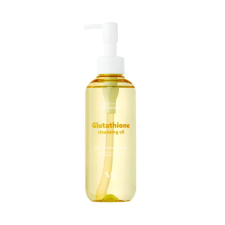 Un flacon transparent de 200 ml de « Vt Huile Démaquillante Éclat et Hydratation au Glutathion », muni d'une pompe blanche et d'une étiquette au texte doré, est représenté debout sur un fond blanc uni. Dakar