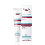 Le tube et la boîte de la crème apaisante intensive Eucerin AtopiControl, tous deux blancs rehaussés de touches de rouge et de bleu clair, sont représentés debout sur un fond blanc. Dakar