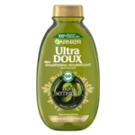 Un flacon vert de 300 ml de shampoing nourrissant Garnier Ultra Doux « Olive Mythique » pour cheveux secs et sensibles, doté d'un bouchon doré et d'étiquettes mettant en avant ses ingrédients naturels et son emballage 100 % recyclable. Dakar