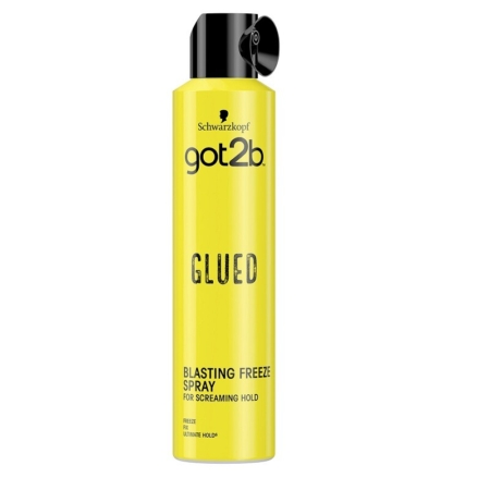 Une bombe jaune de 300 ml de Got2b Glued Blasting Freeze Spray Fixation Extrême, dotée d'un embout noir et arborant un lettrage noir et argenté, pour une tenue ultra-forte et un contrôle maximal. Dakar
